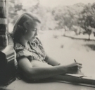 Sylvia Hand Pott ’52 studying on the ledge of her dorm, third east in the main building, 1951.